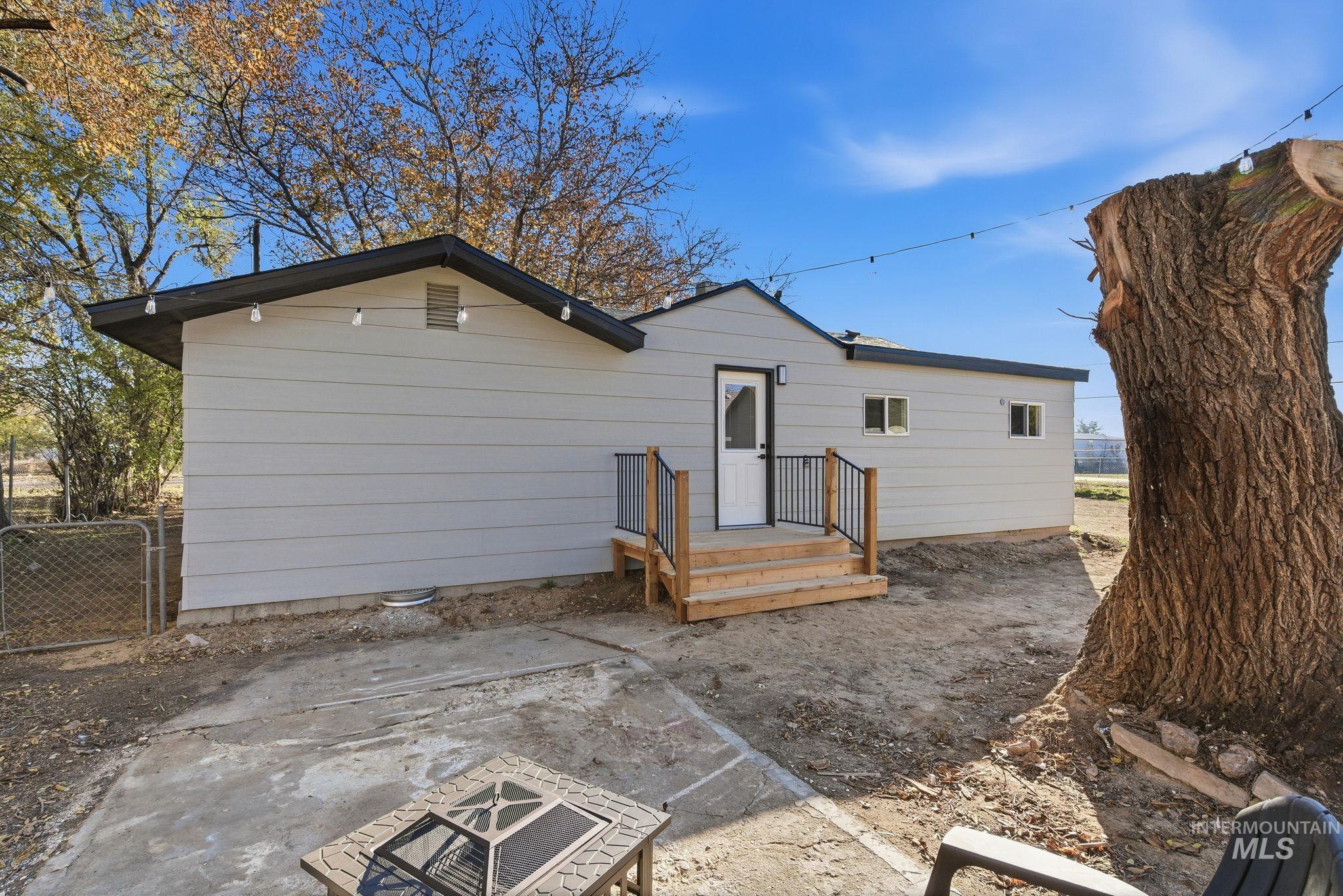 Rear view of house with a patio