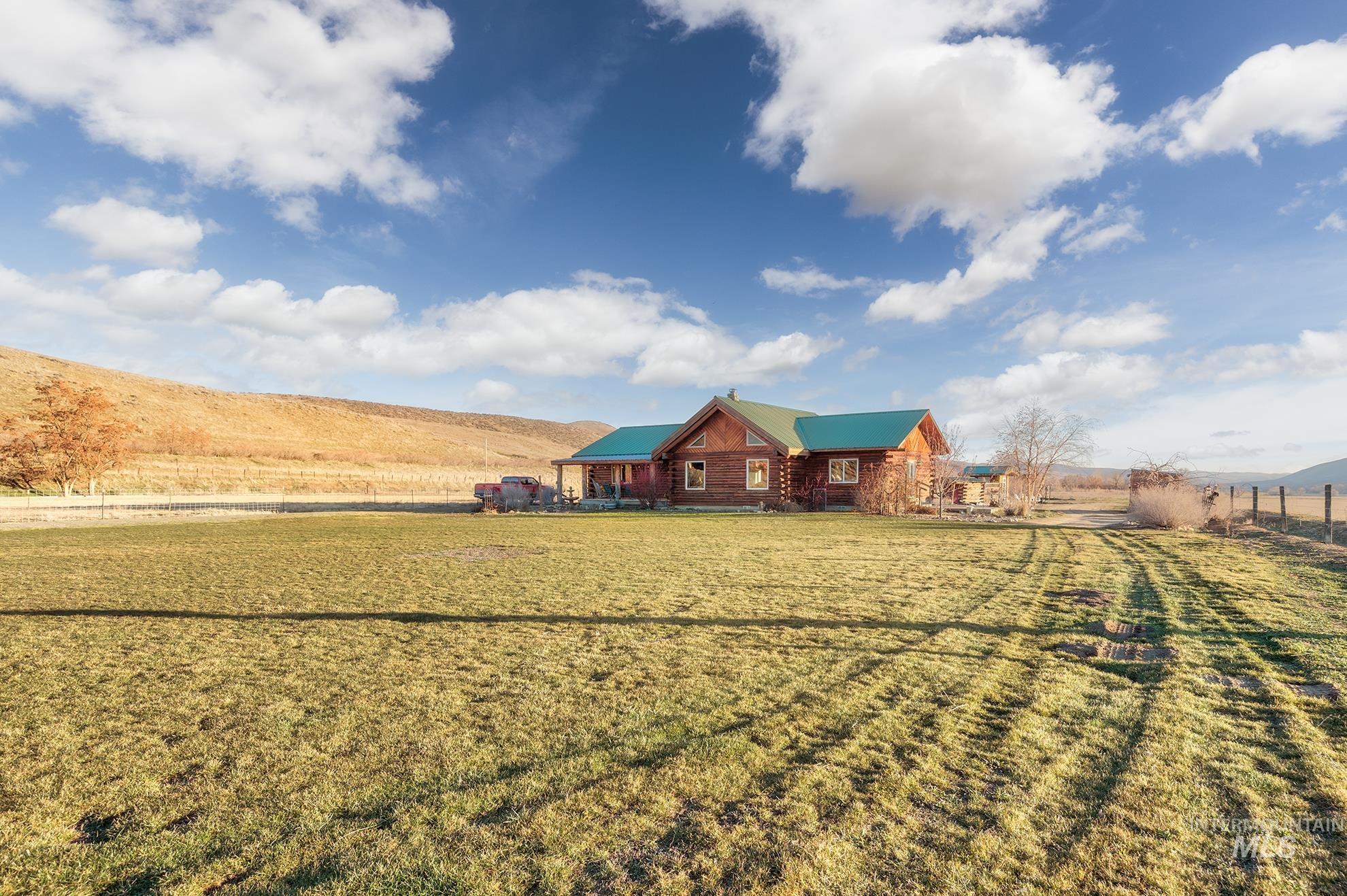 View of grassy yard with a view of rural / pastoral area