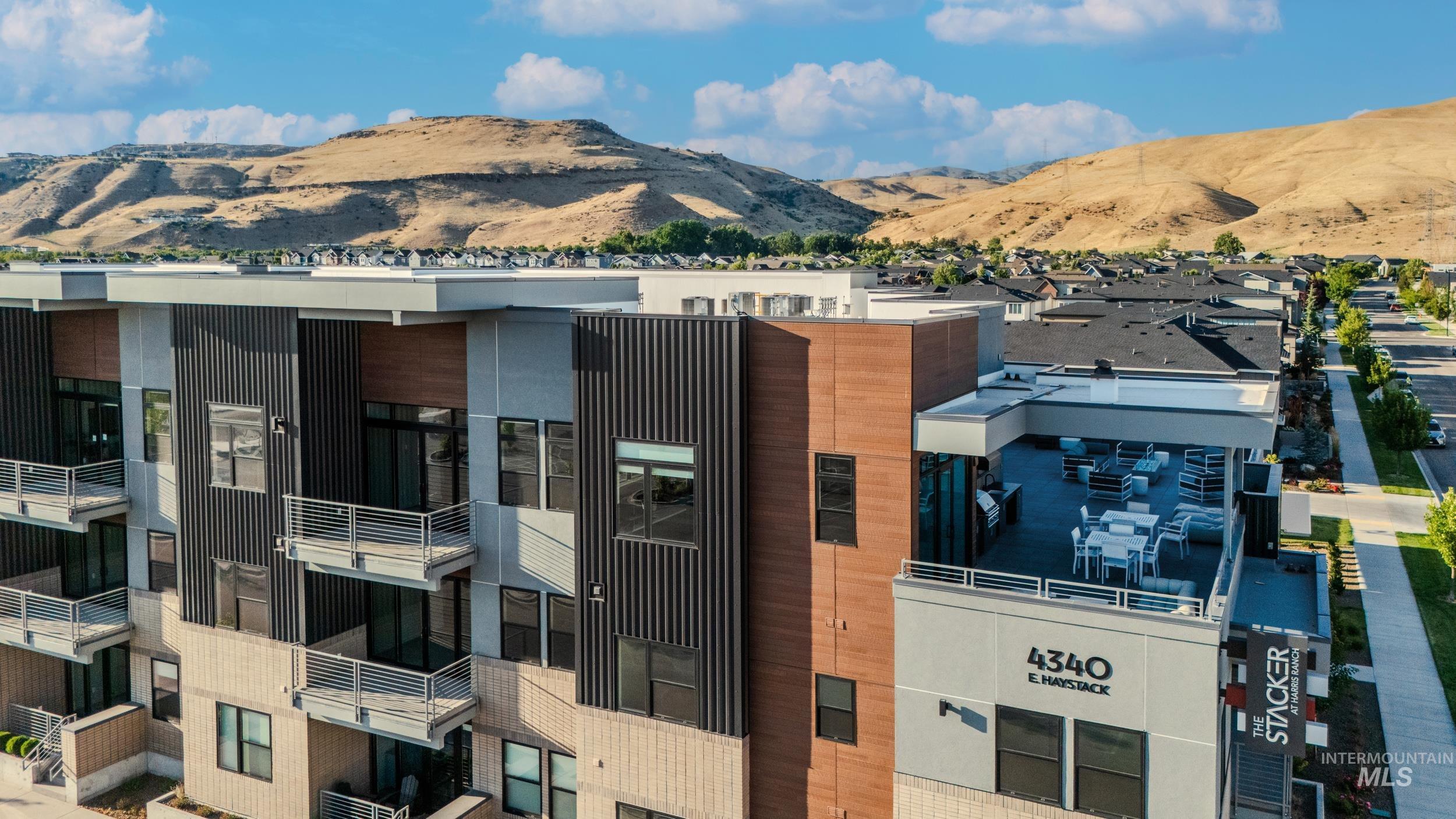 View of property with a mountain view