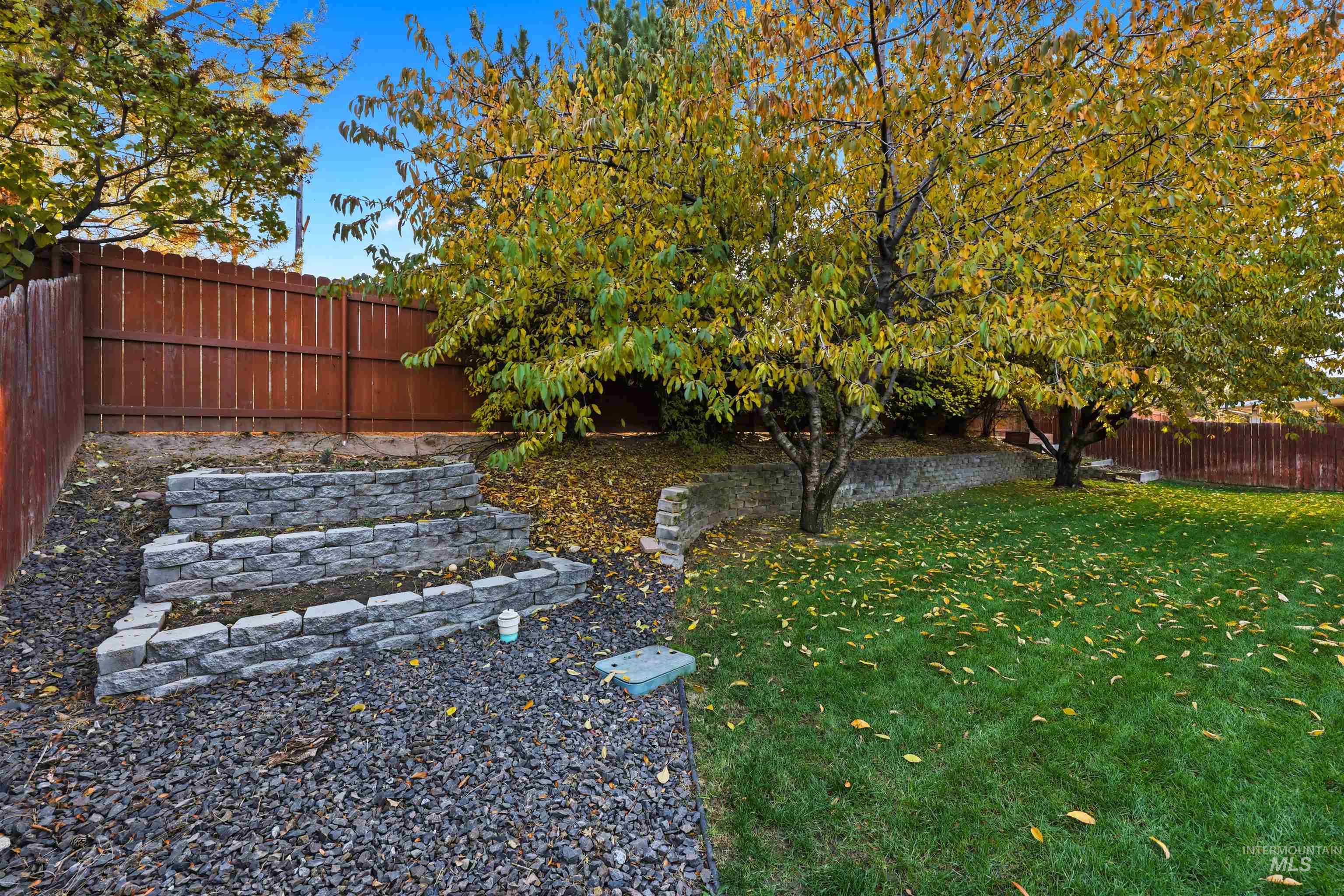View of fenced backyard