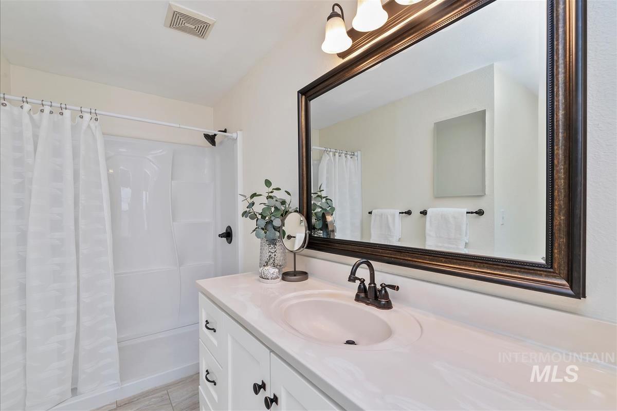 Full bathroom with vanity