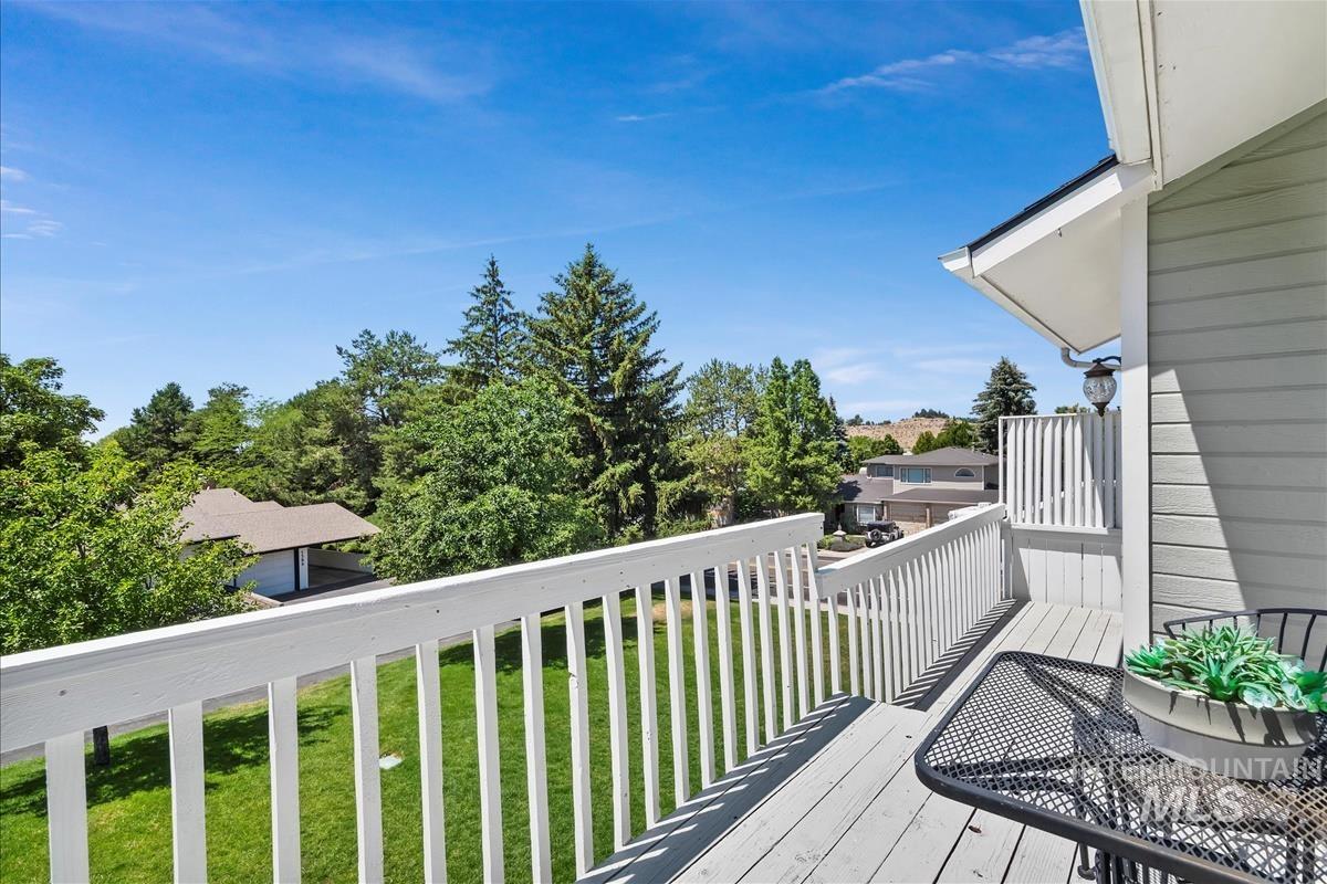 Wooden deck featuring a yard