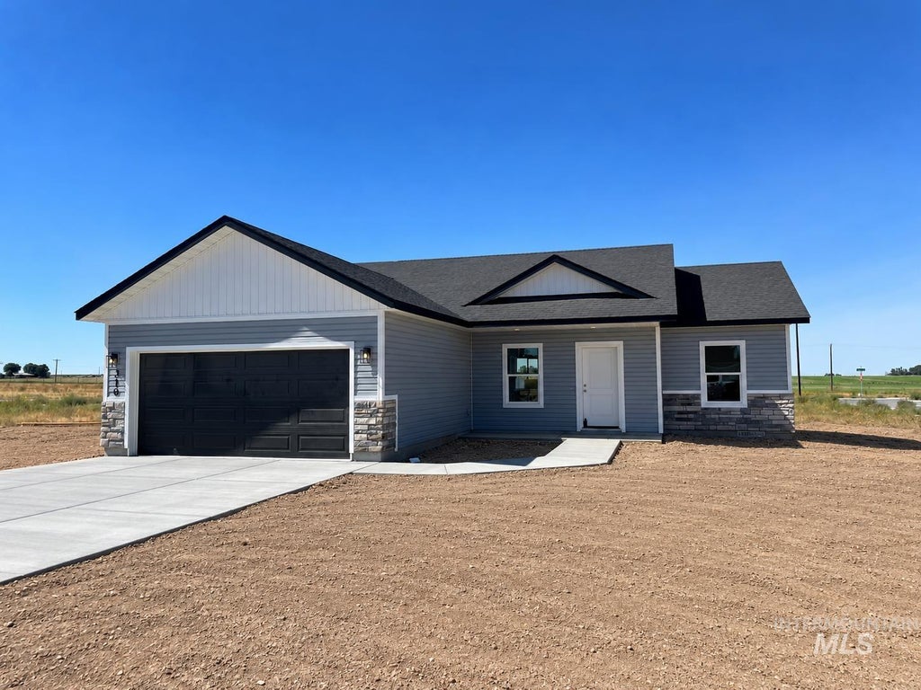 Photo of 310 Willow Ave, Hazelton, ID 83335 (MLS # 99002791)