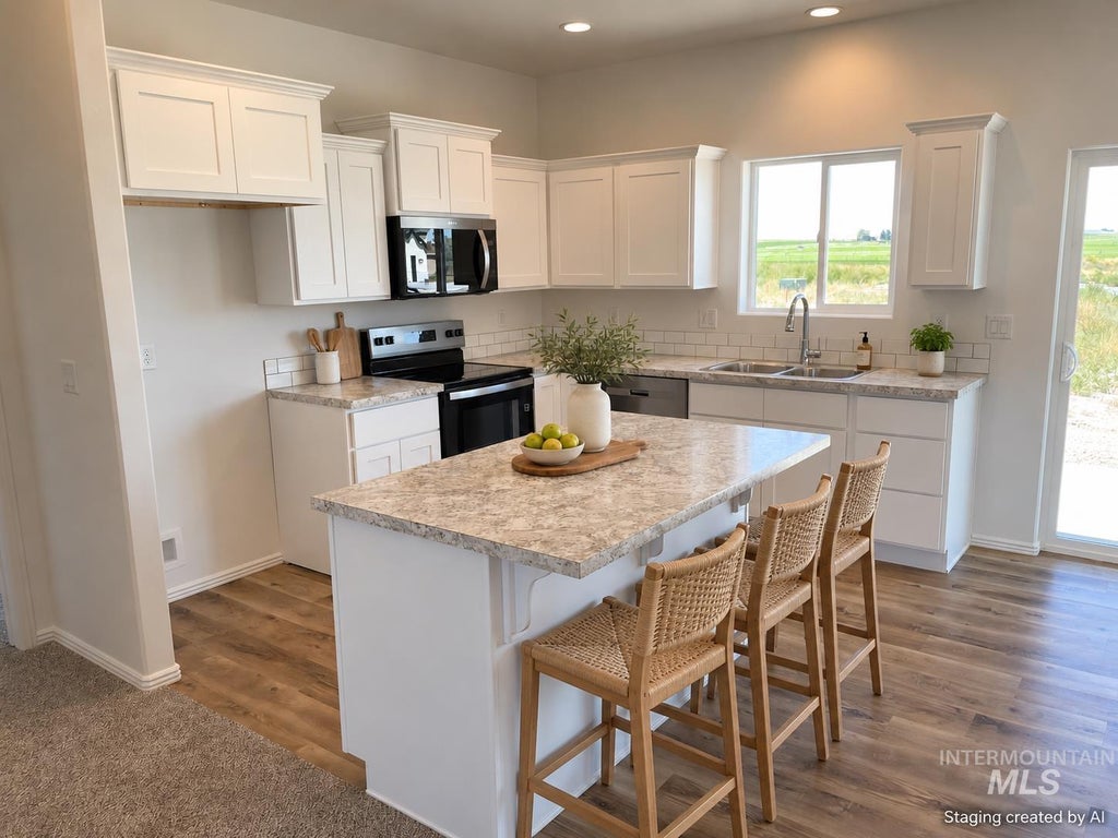 Photo of 310 Willow Ave, Hazelton, ID 83335 (MLS # 99002791)