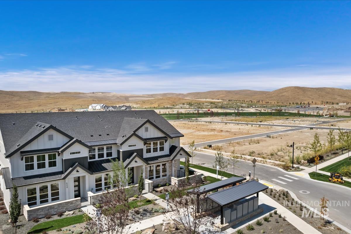 View of subject property featuring a mountain backdrop