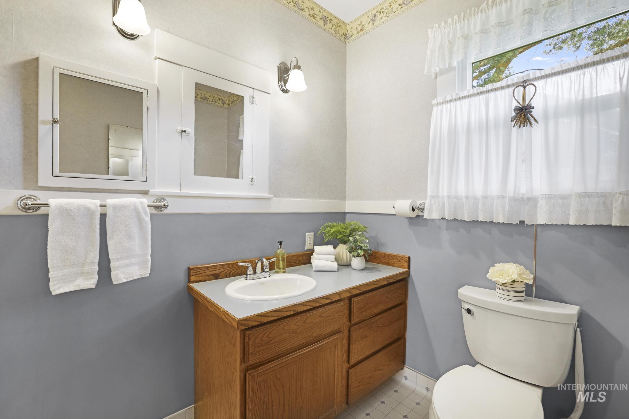 Bathroom with toilet and vanity