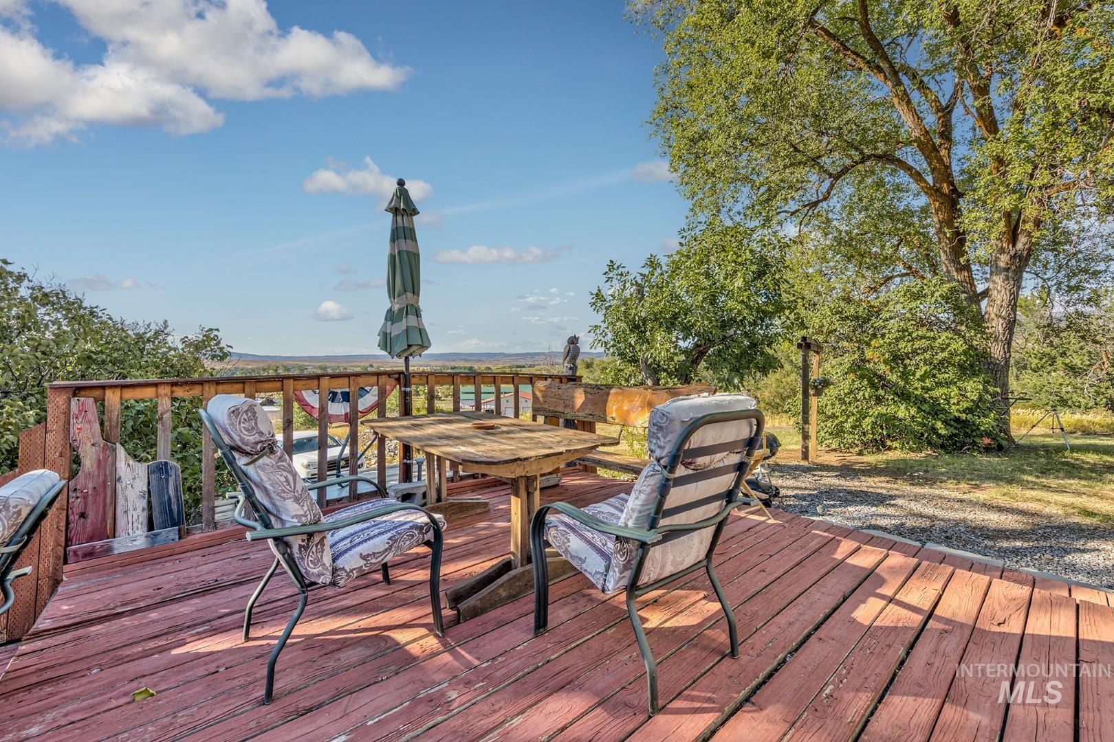 Wooden terrace with outdoor dining area