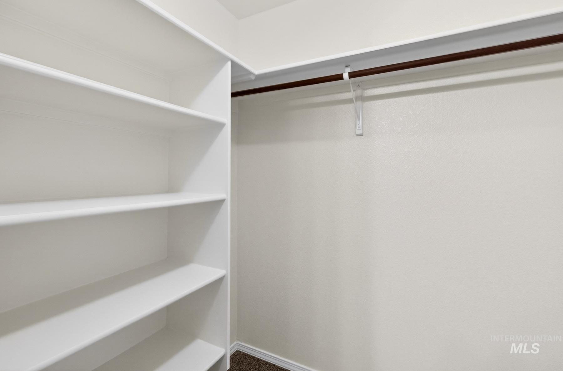 Built-in shelving and hanging rod storage system