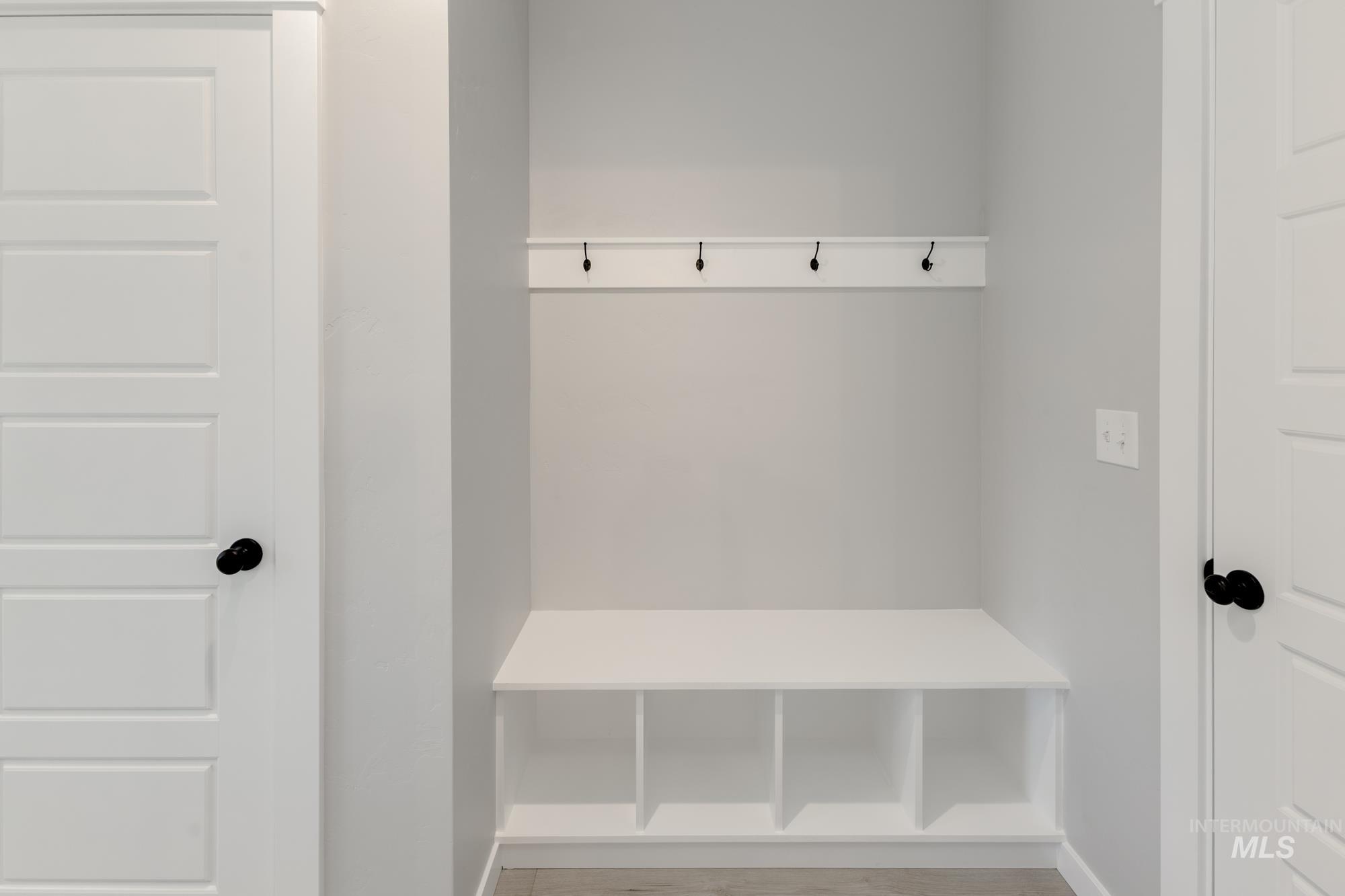 Mudroom featuring baseboards