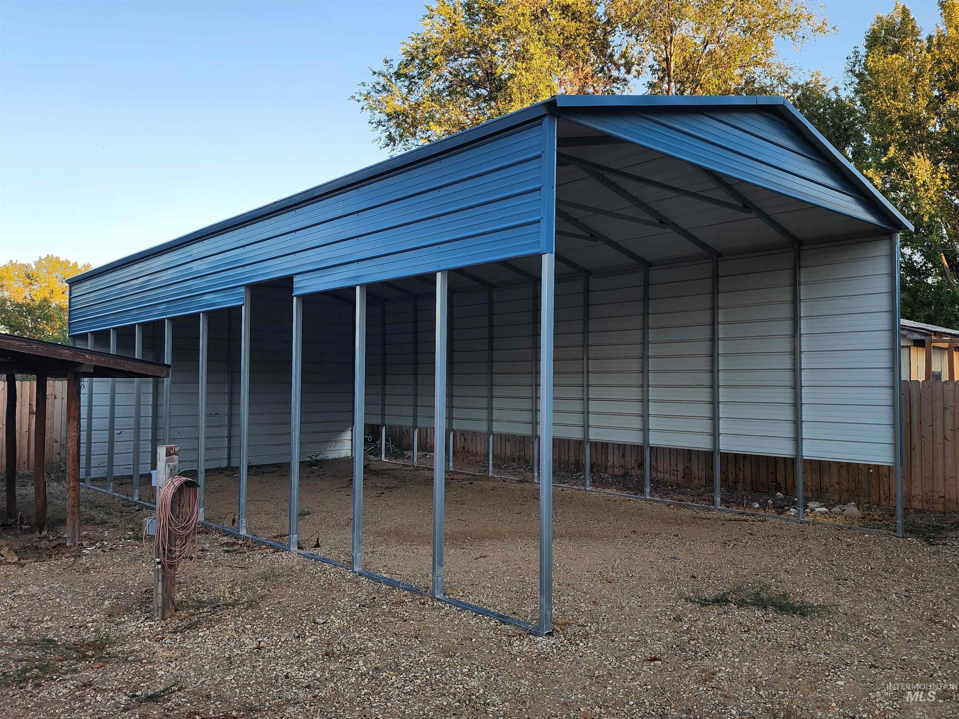 View of outdoor structure featuring a carport