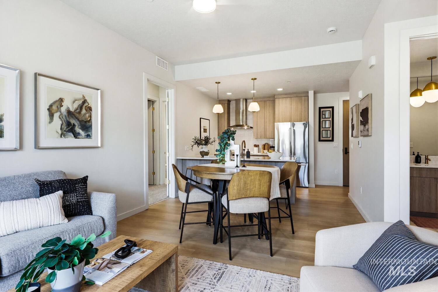 Dining room featuring light wood-type flooring and recessed lighting