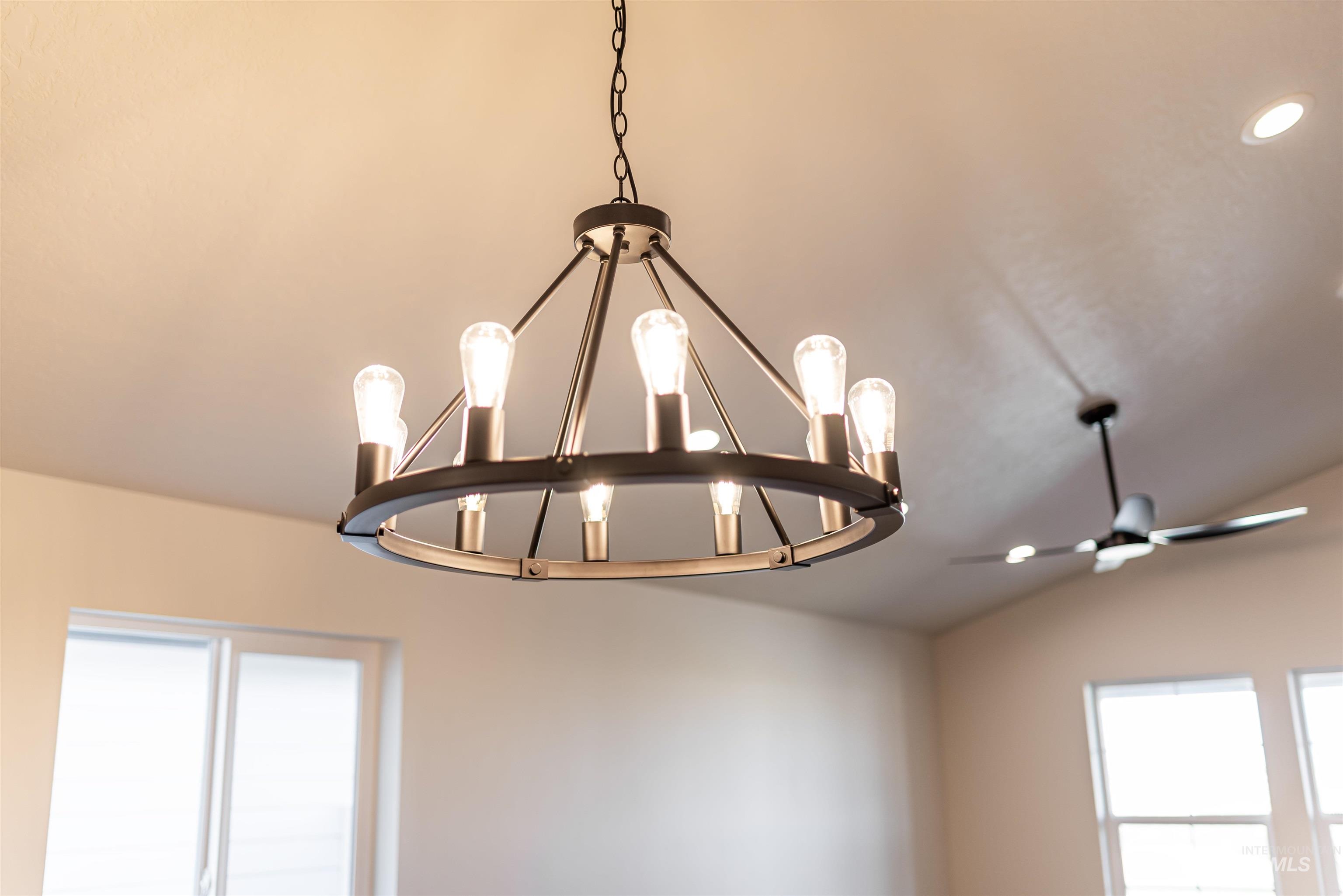 Detailed view of a chandelier and recessed lighting