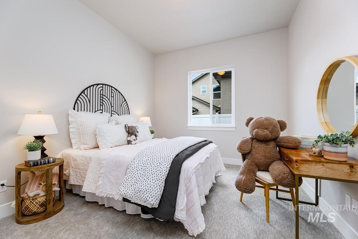 Bedroom featuring carpet