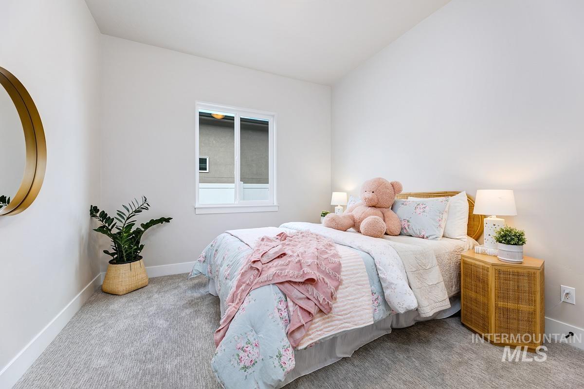Bedroom featuring carpet flooring