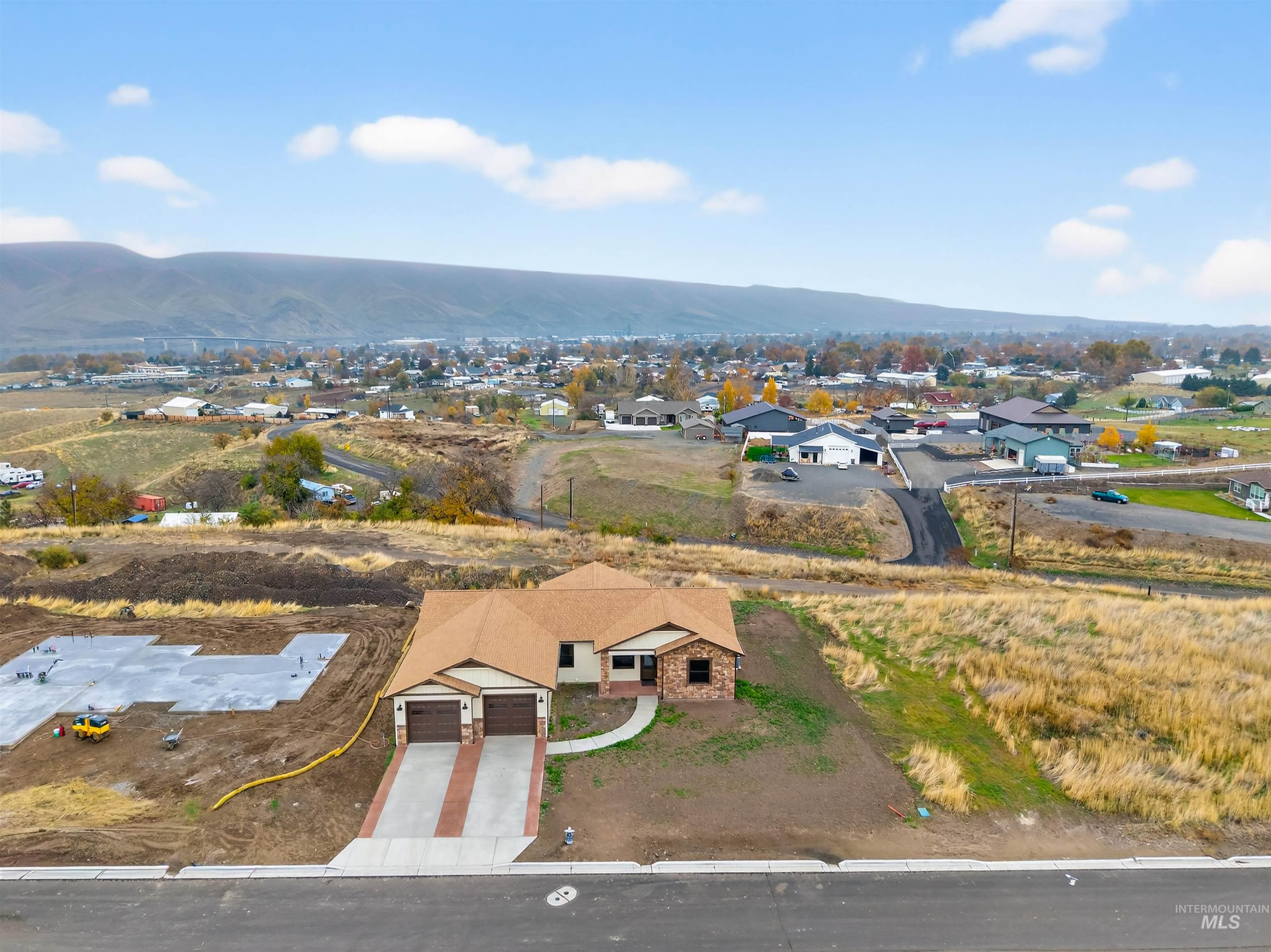 Aerial view of residential area with mountains