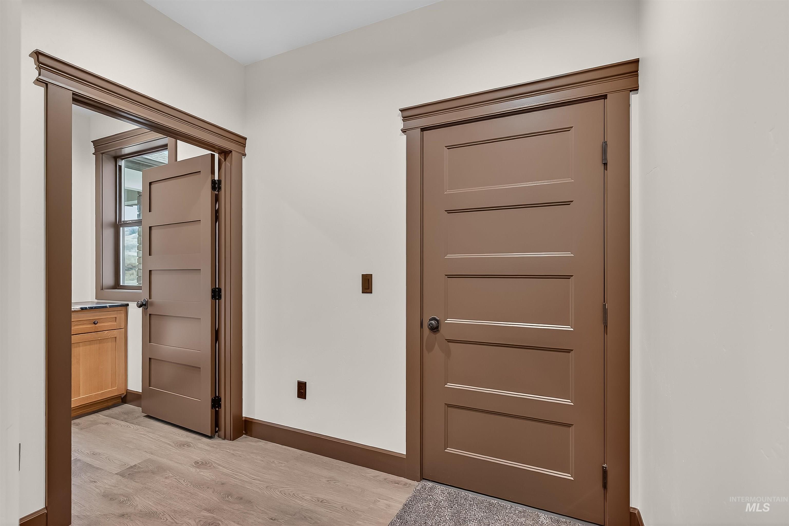 Foyer featuring light wood-type flooring