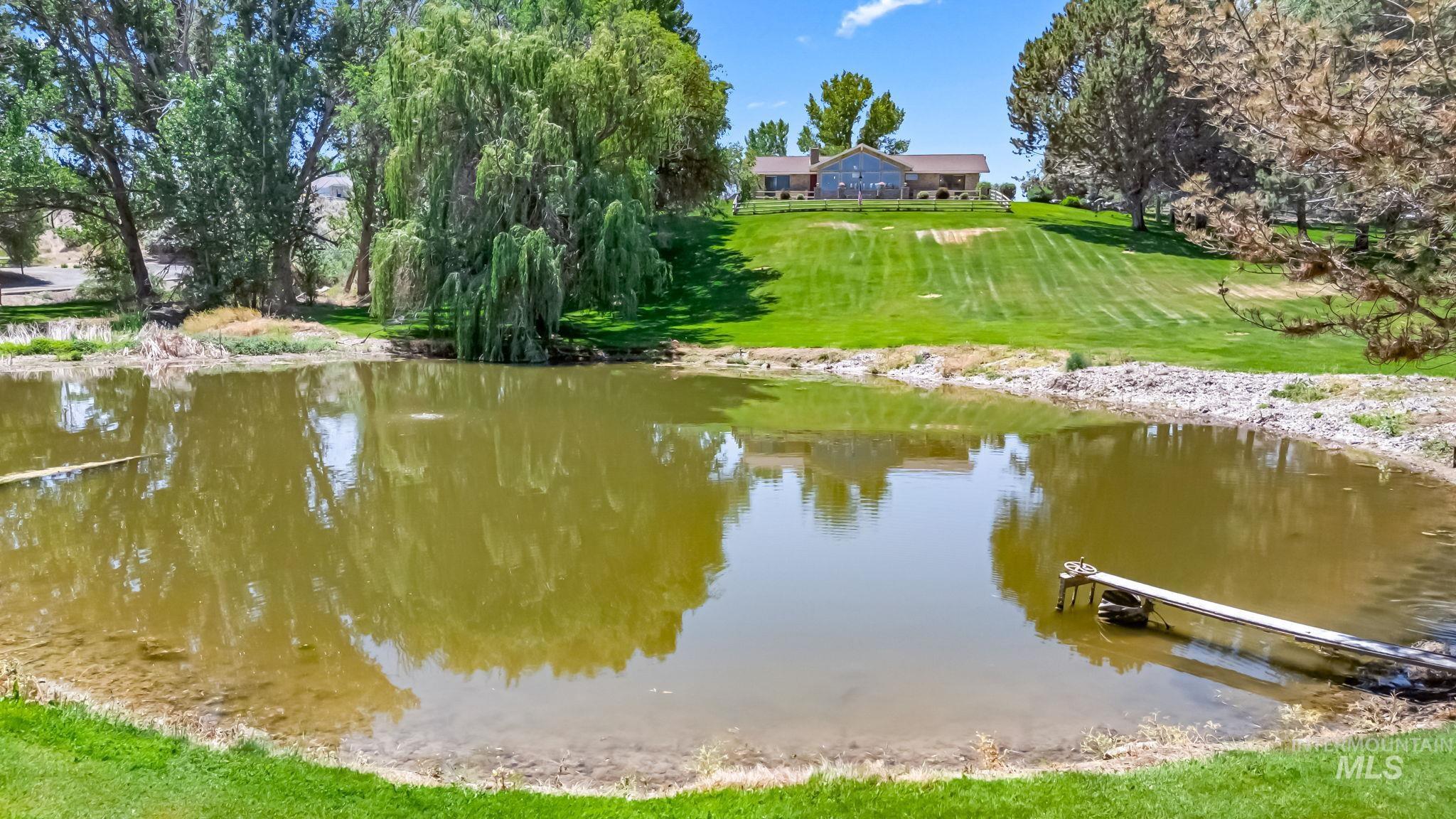 Dock featuring a water view