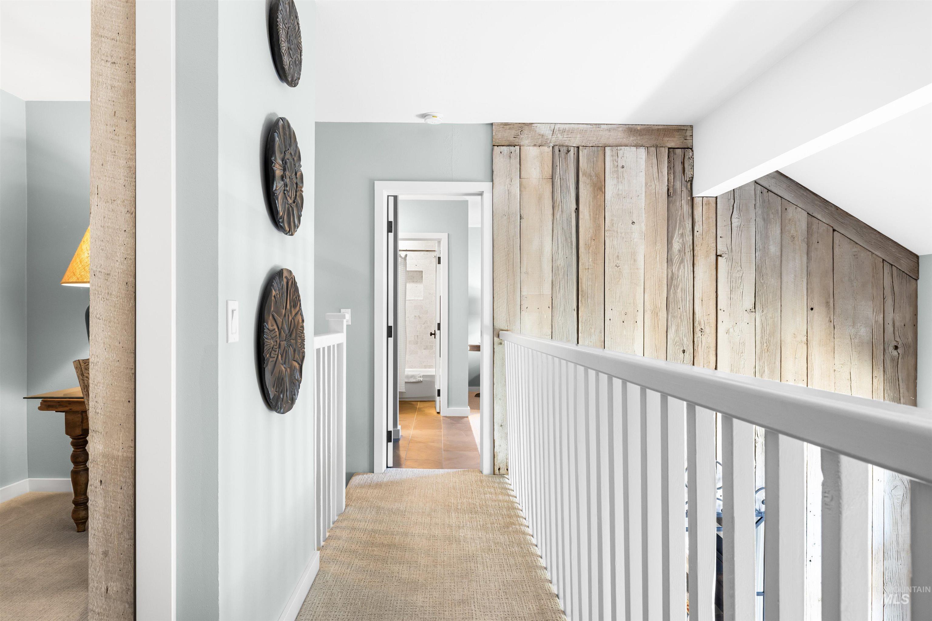 Corridor with carpet flooring