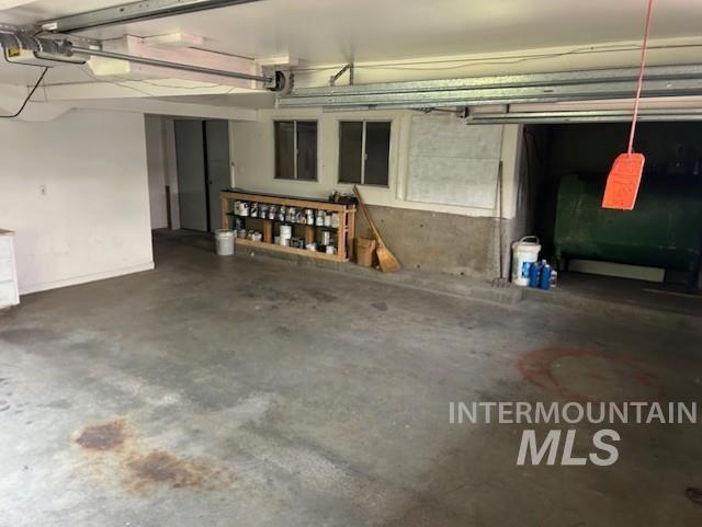 Garage featuring oil tank