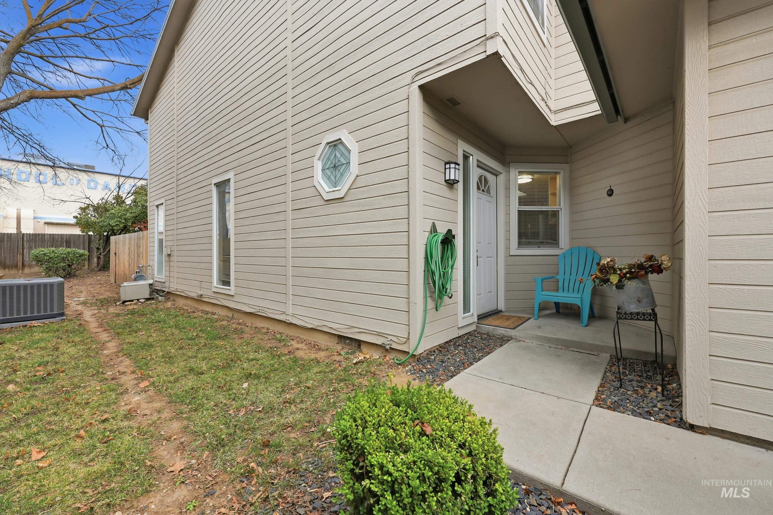 View of home's exterior with a central AC unit