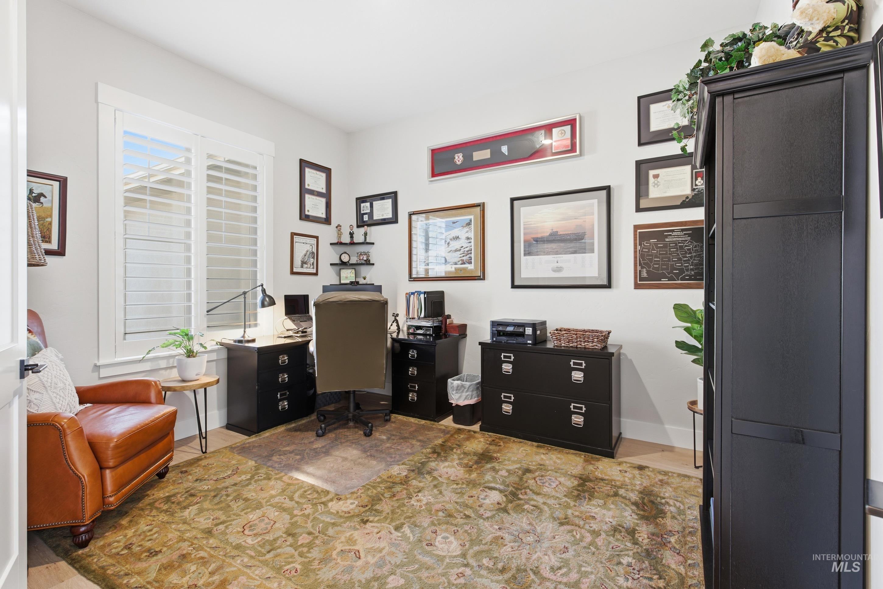 Office space with light wood finished floors