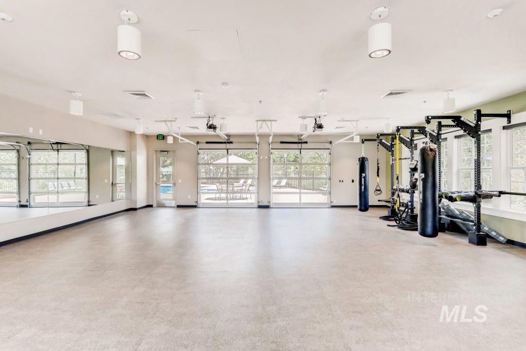 Exercise room featuring baseboards
