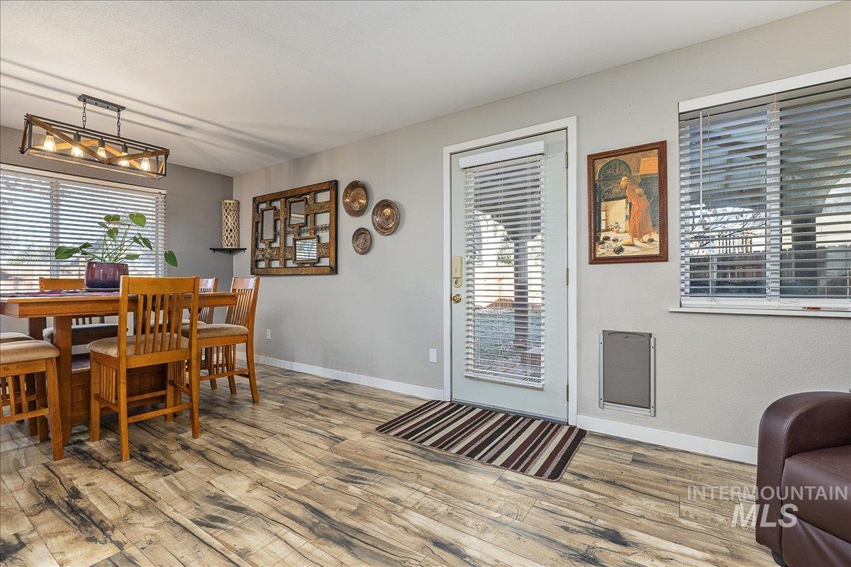 Dining room with wood finished floors