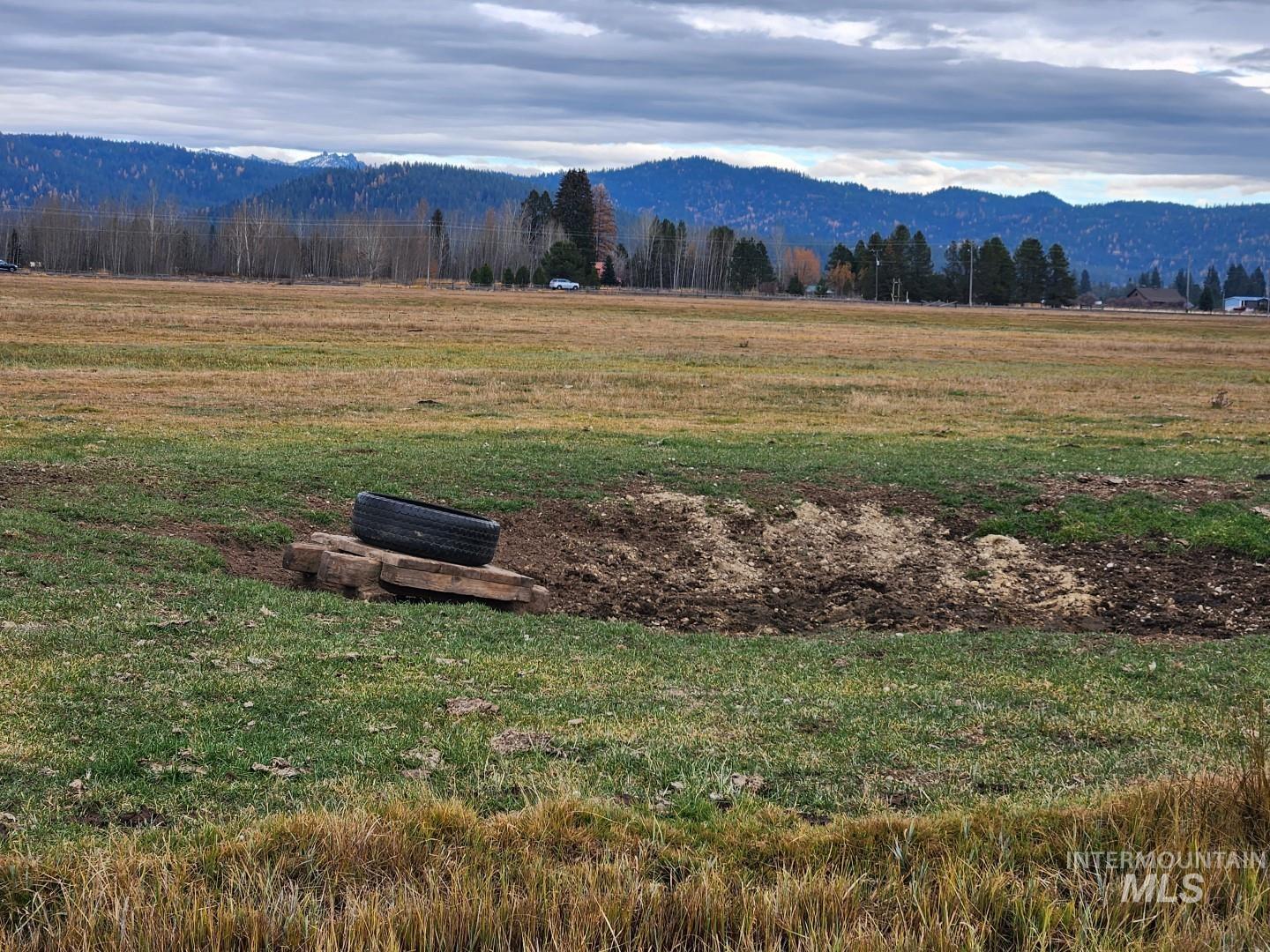 View of mountain backdrop featuring rural landscape