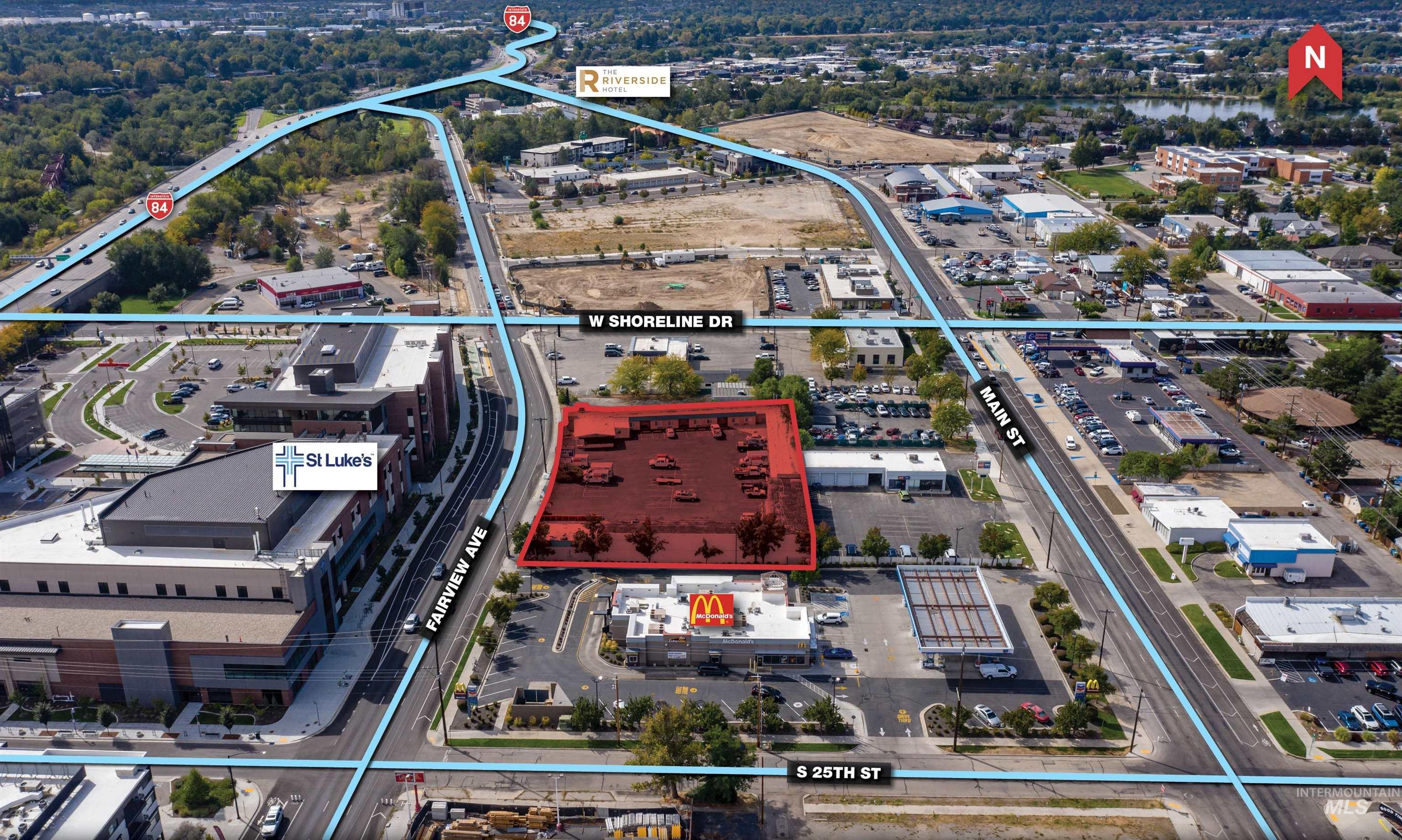 Aerial view of property and surrounding area with property boundaries highlighted