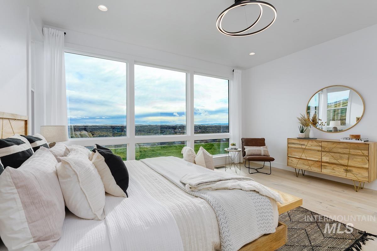Bedroom featuring wood finished floors and recessed lighting