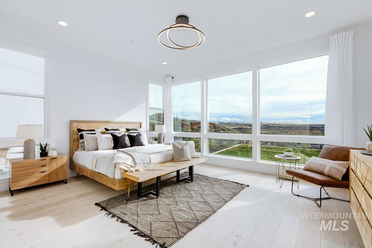 Bedroom featuring light wood-type flooring and recessed lighting