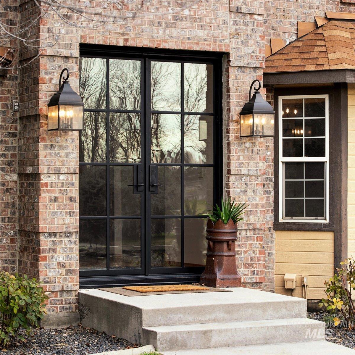 Entrance to property featuring french doors