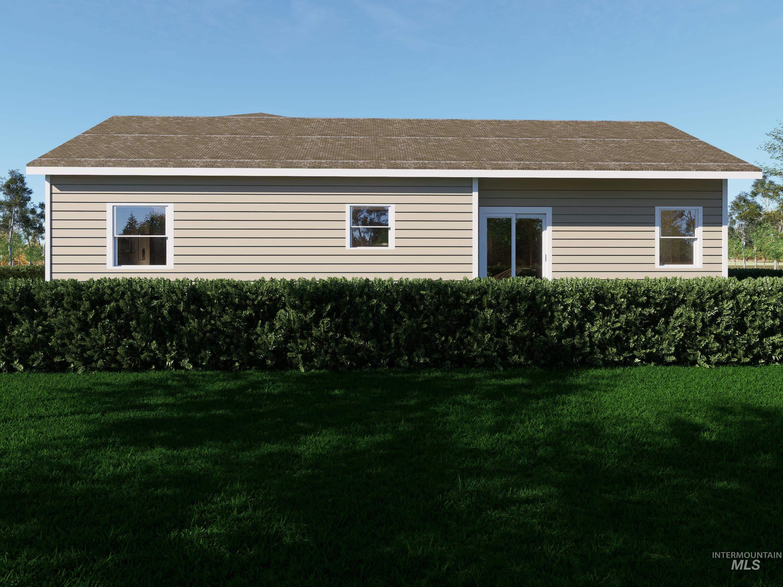 View of home's exterior with a lawn