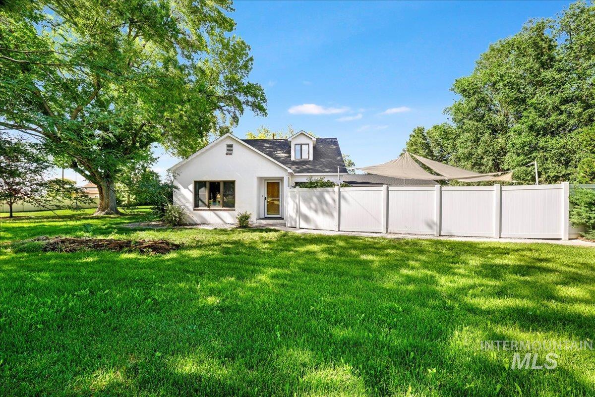View of front of house with stucco siding