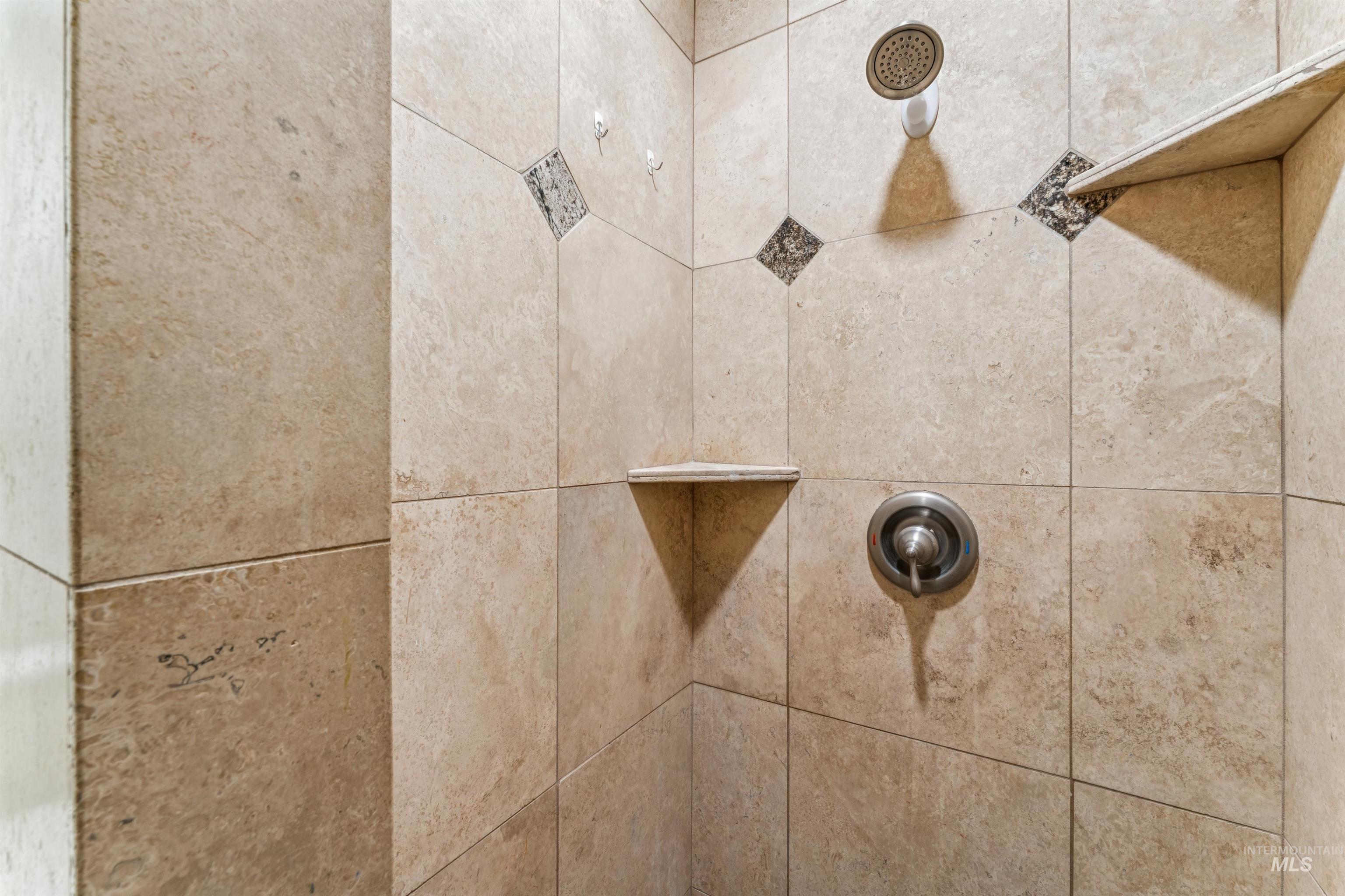Bathroom view of tiled shower