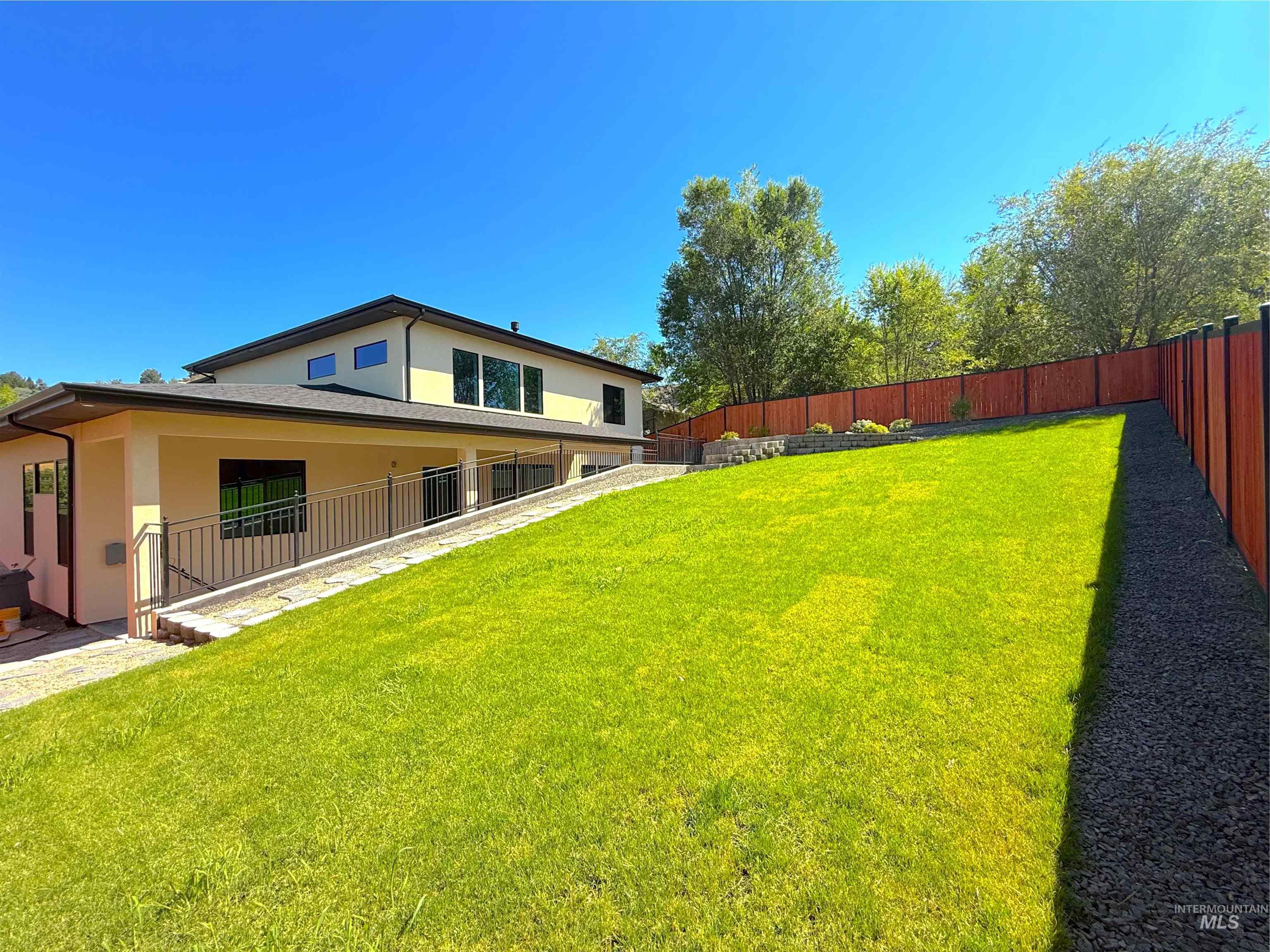 Fenced backyard featuring a patio area