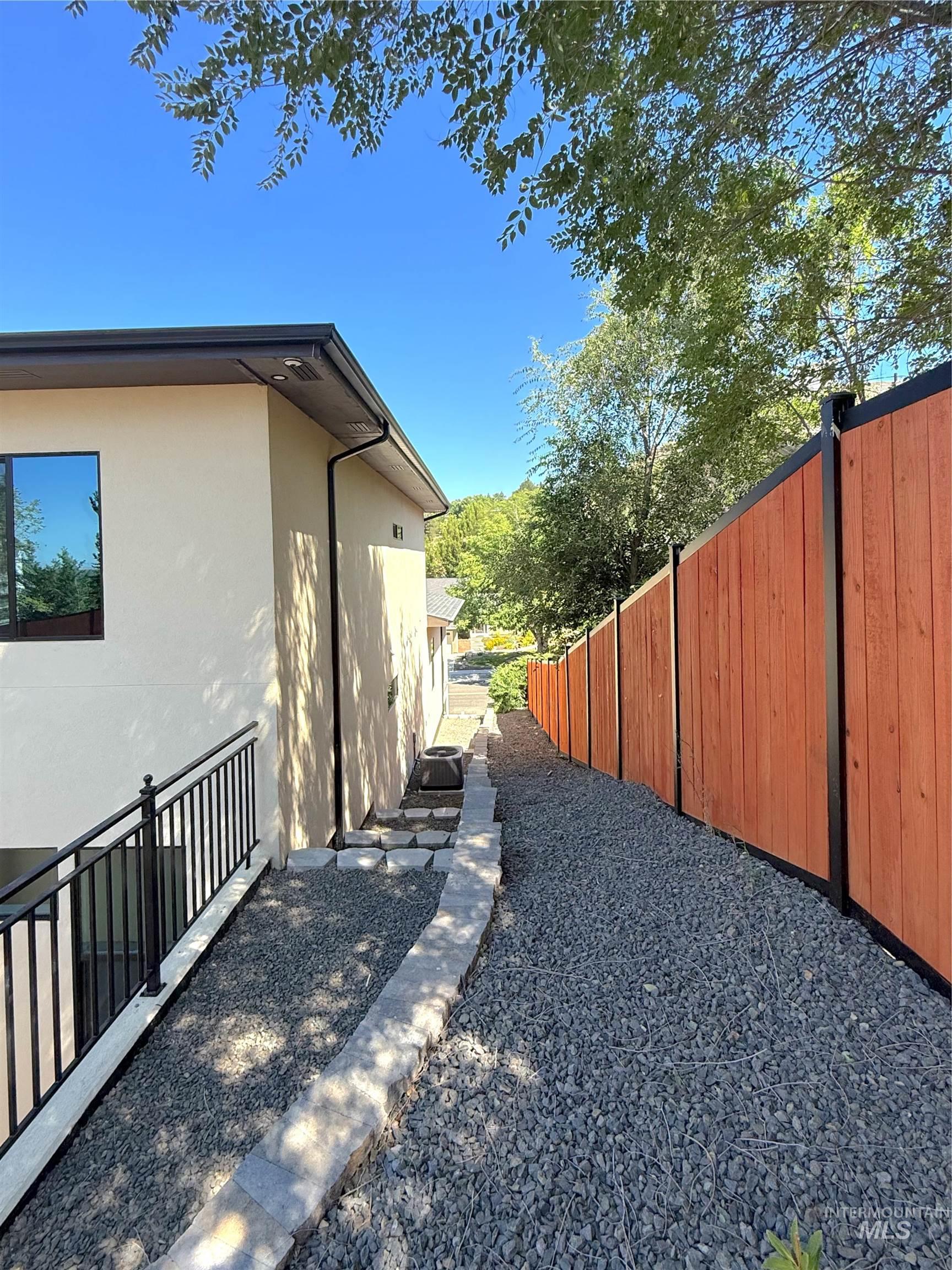 View of side of property with stucco siding