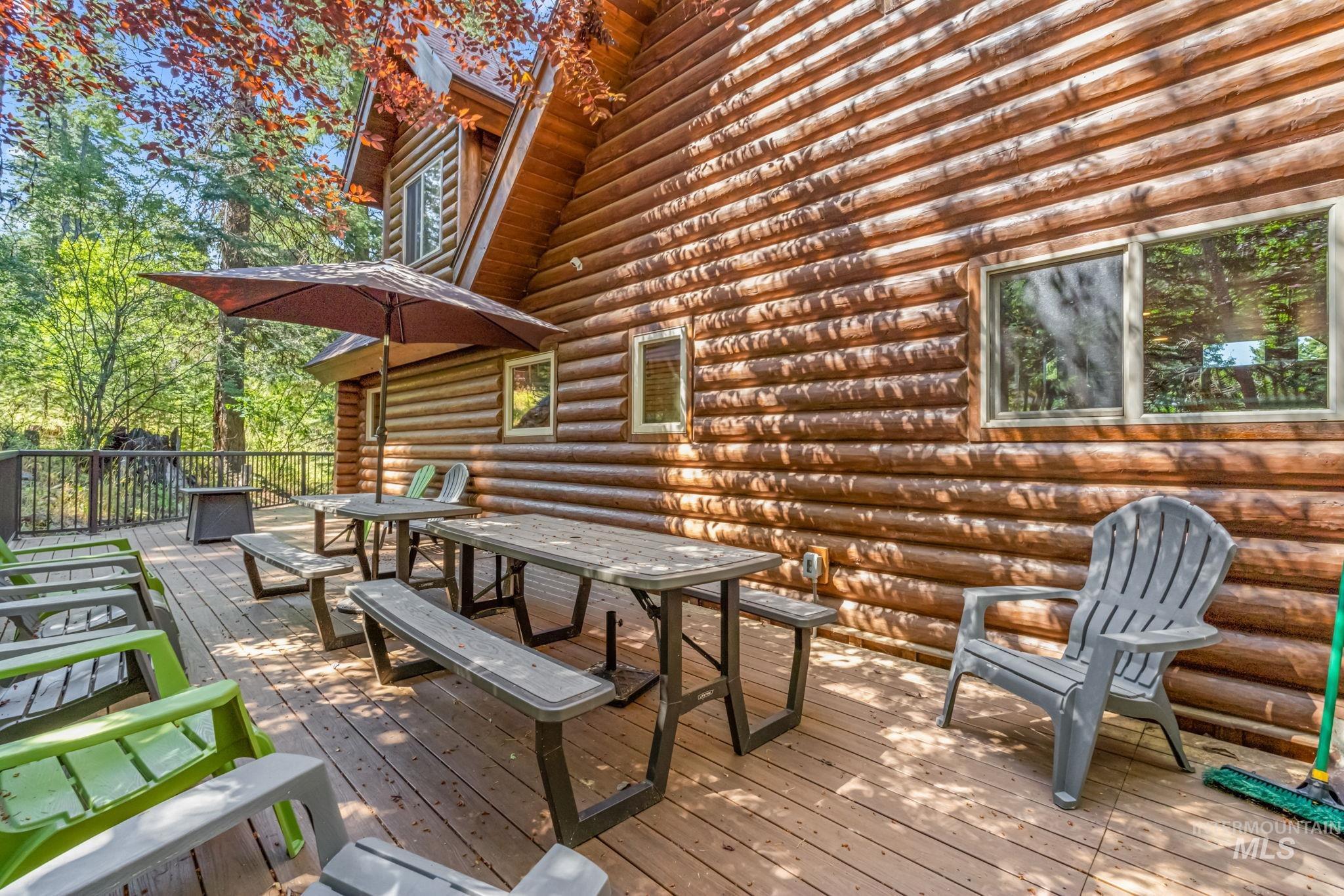 Wooden terrace with outdoor dining space