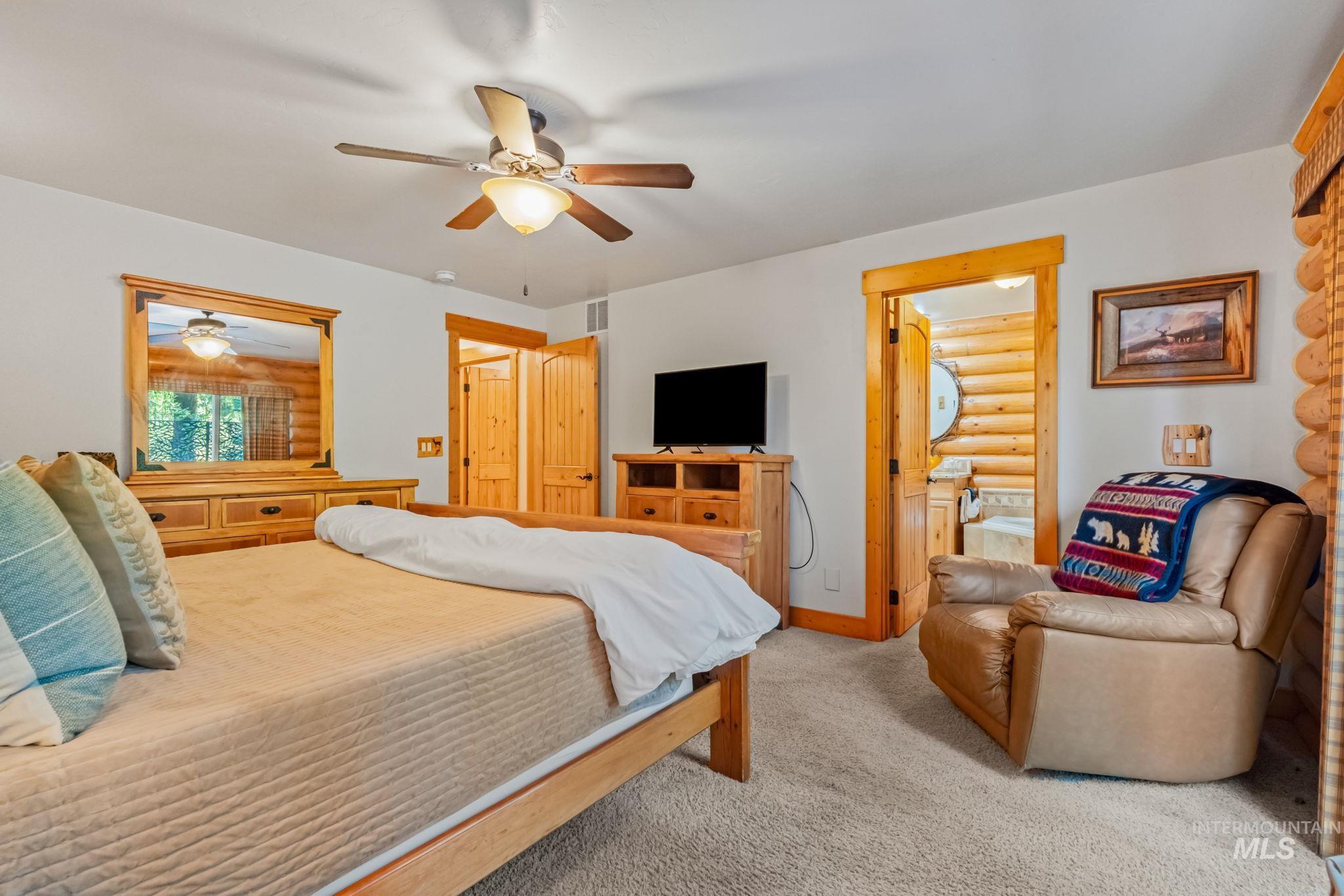 Bedroom with carpet floors and ceiling fan