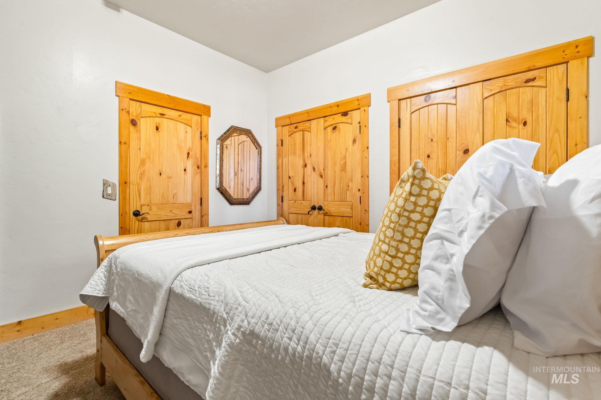 Bedroom with a closet and baseboards