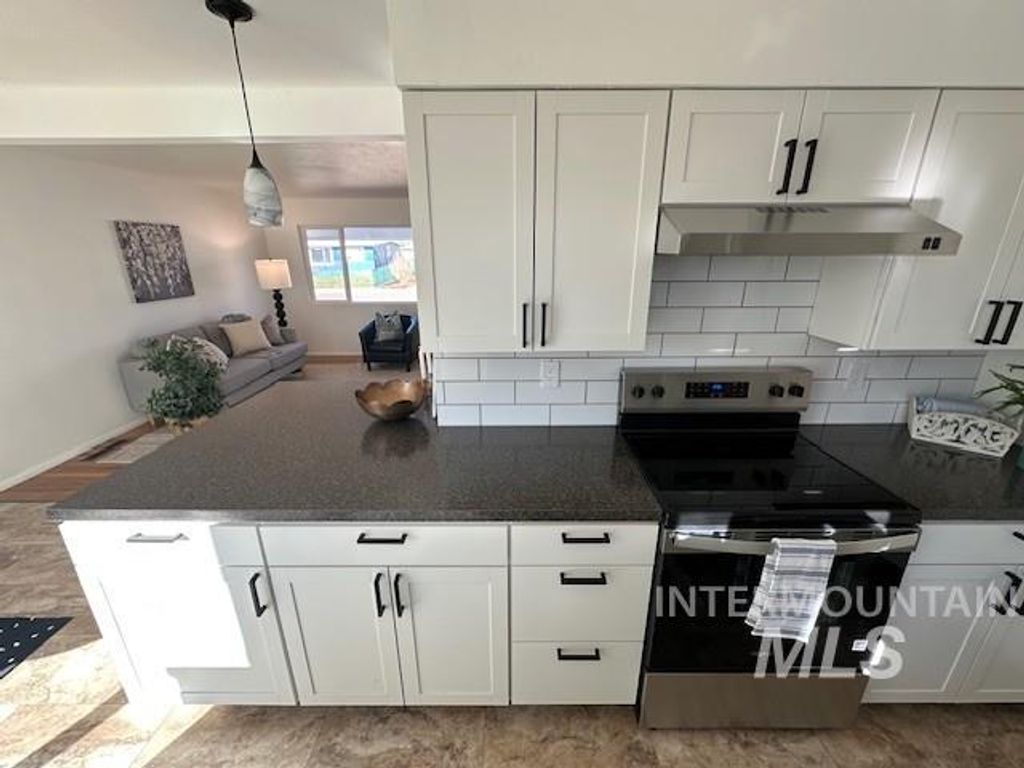 Photo of 775 S 13th, Mountain Home, ID 83647 (MLS # 98978752)