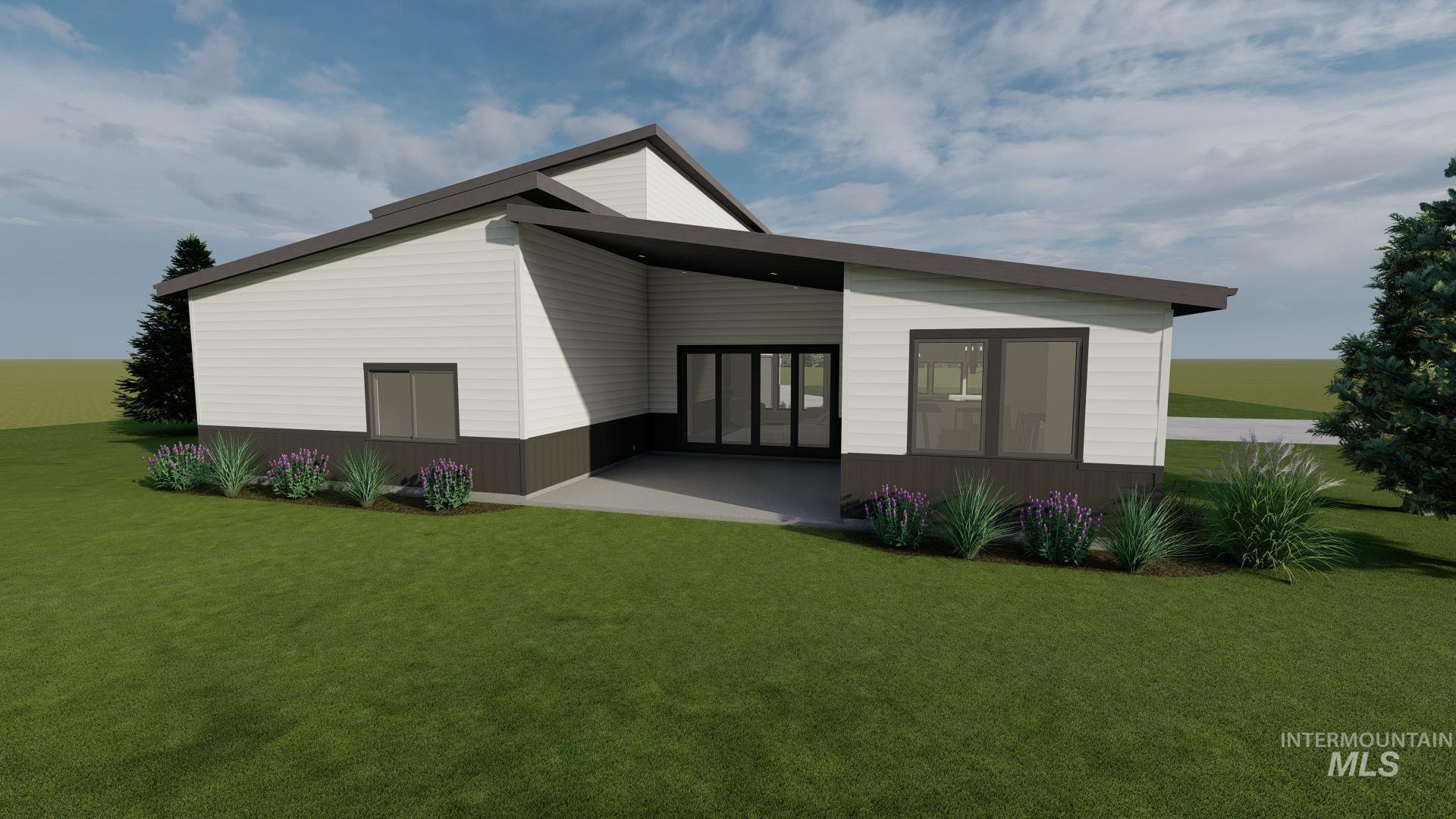 Back of house with covered patio area