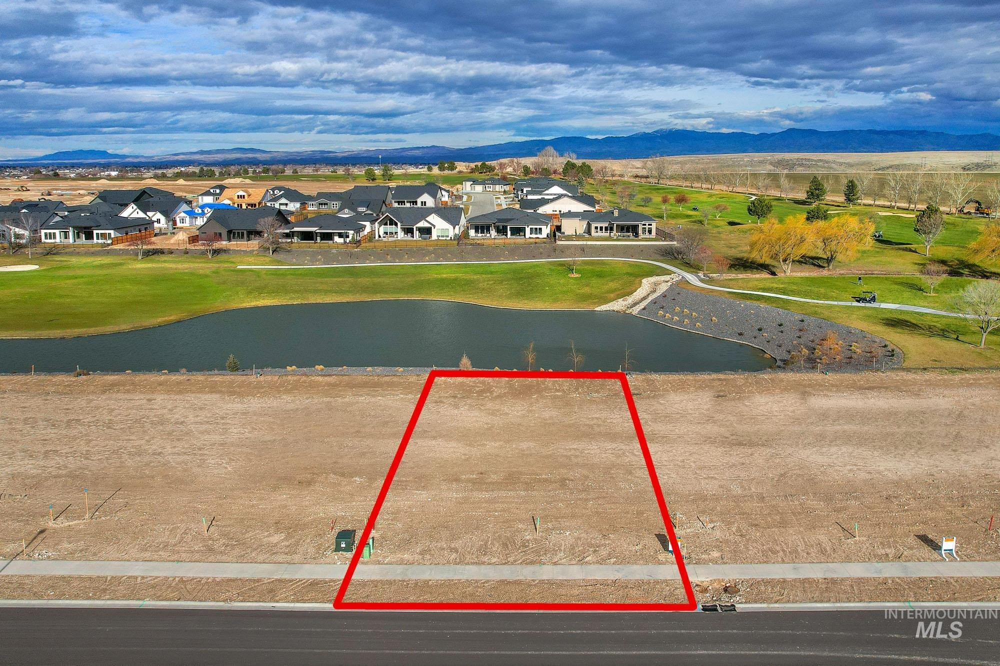 View of property location featuring property parcel outlined and a water and mountain view