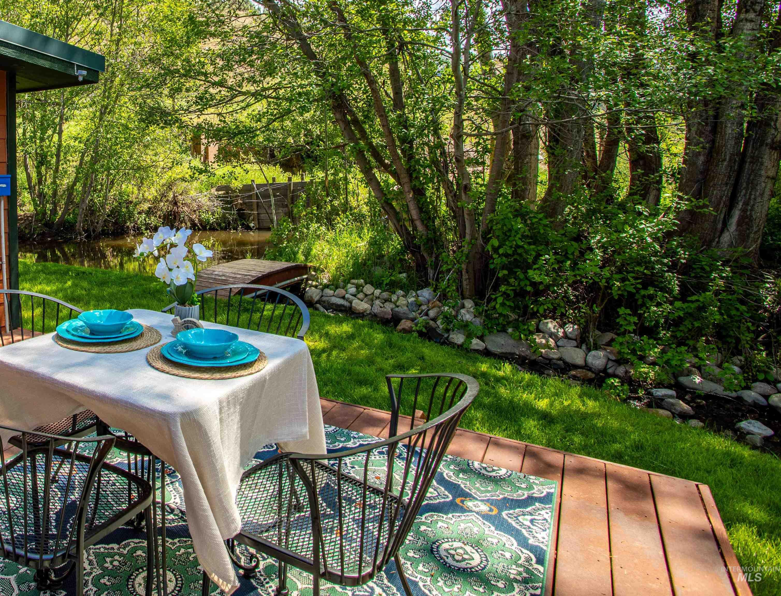 View of patio with outdoor dining area