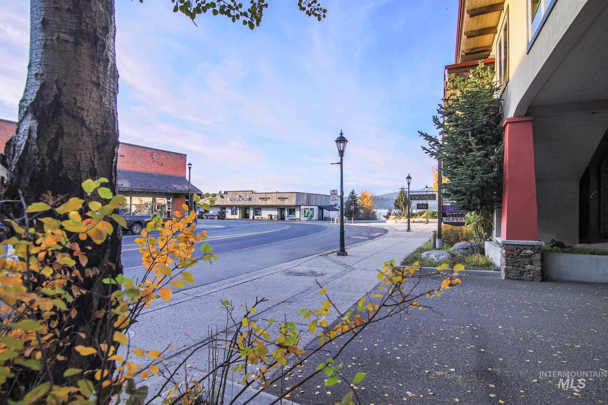 View of street featuring street lights and sidewalks