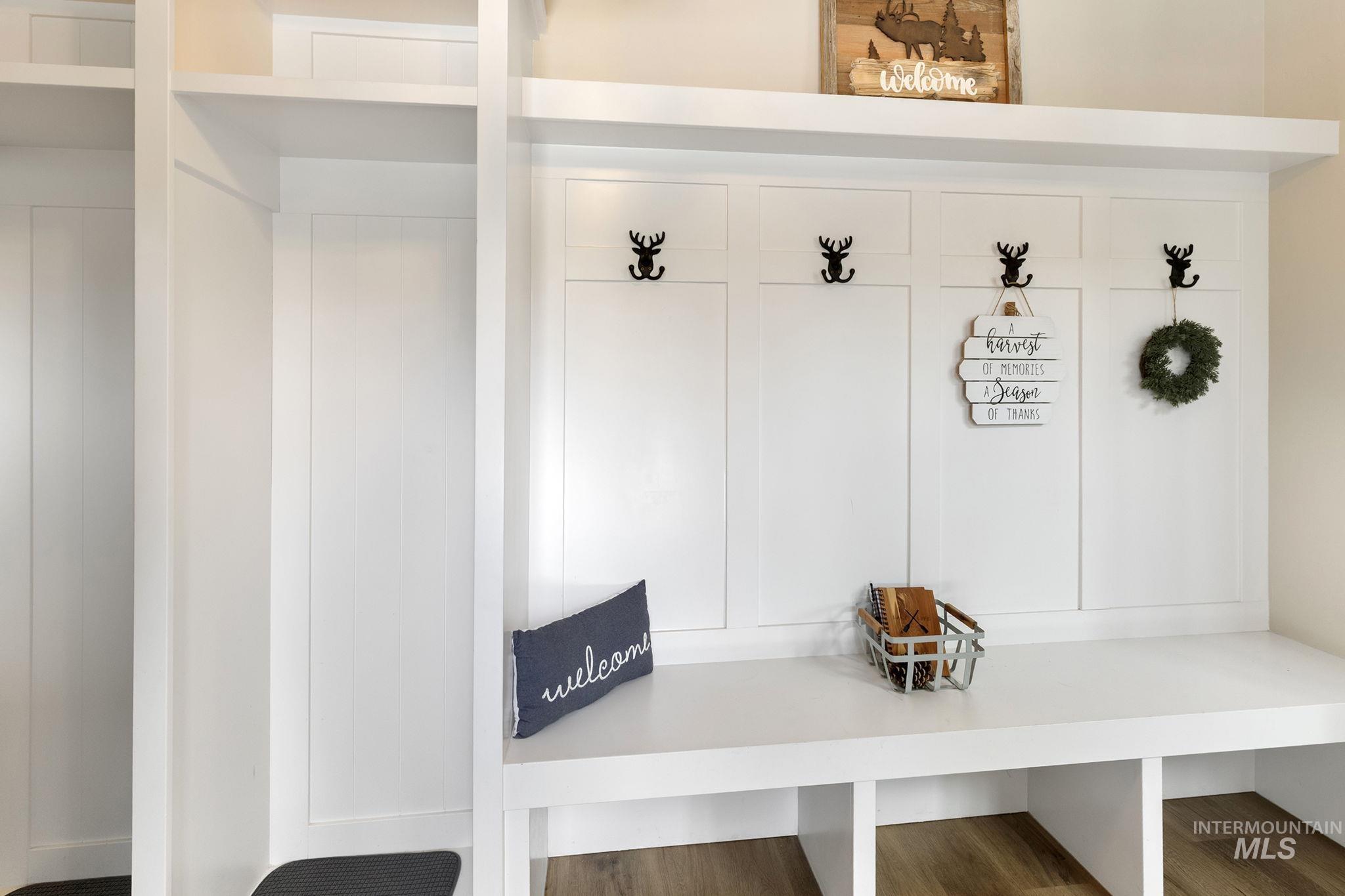 Mudroom featuring wood finished floors