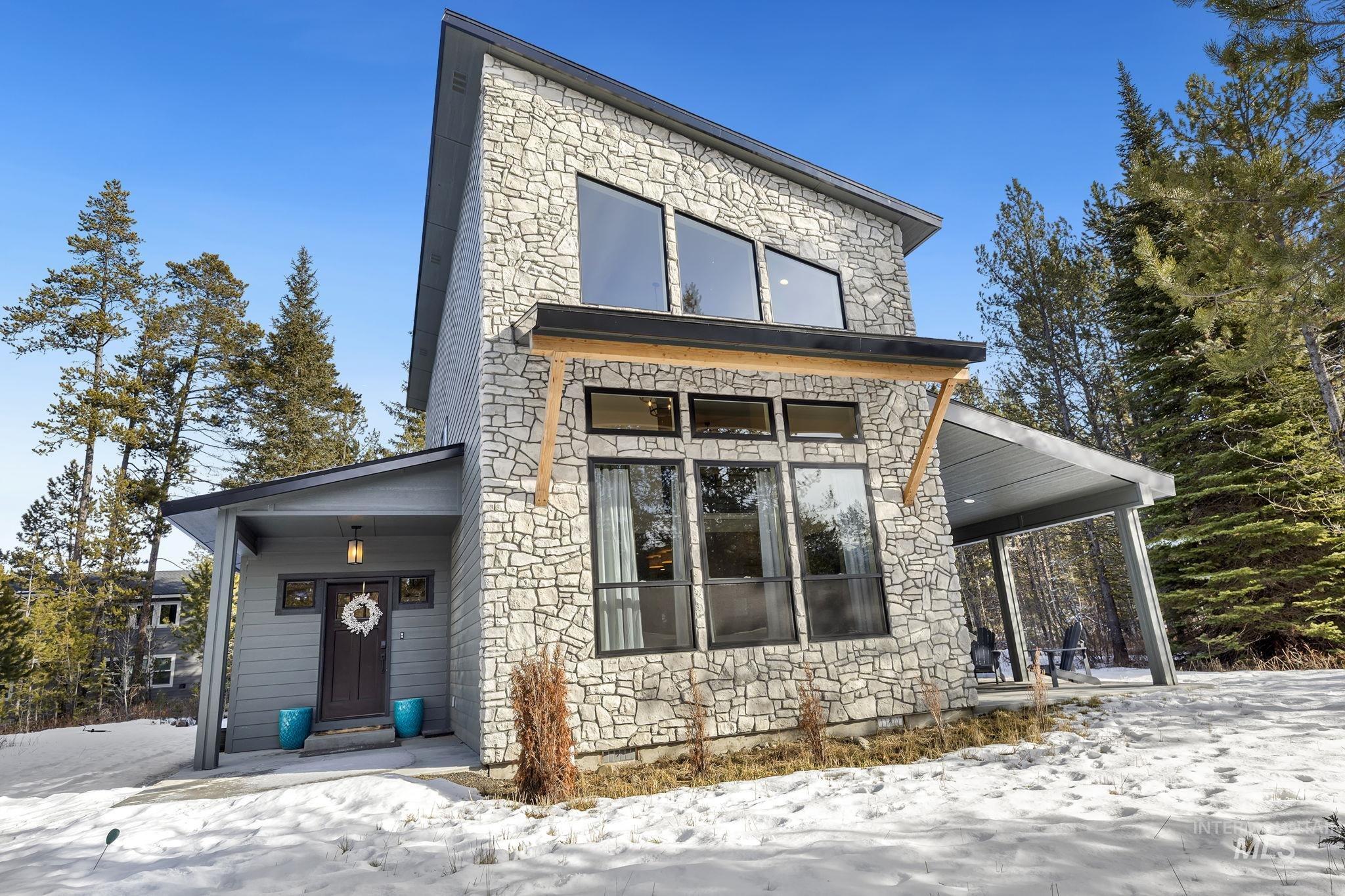 Contemporary house with stone siding