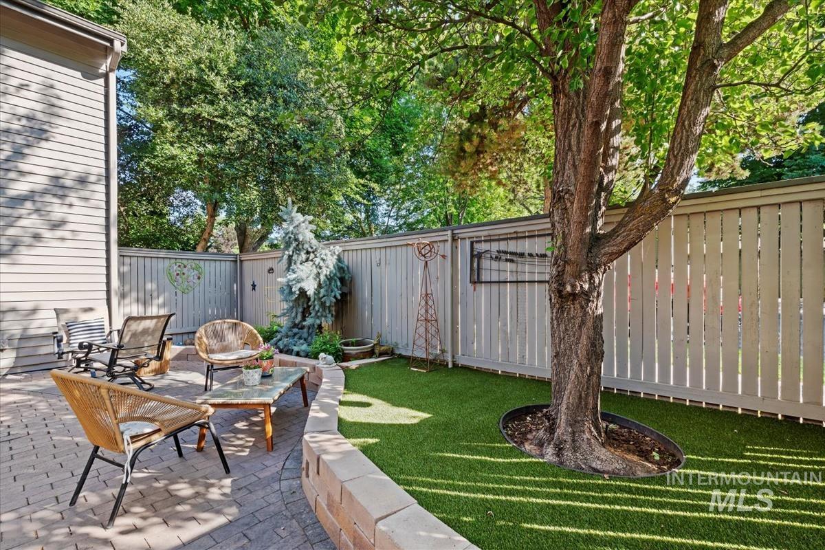 Fenced backyard featuring a patio area
