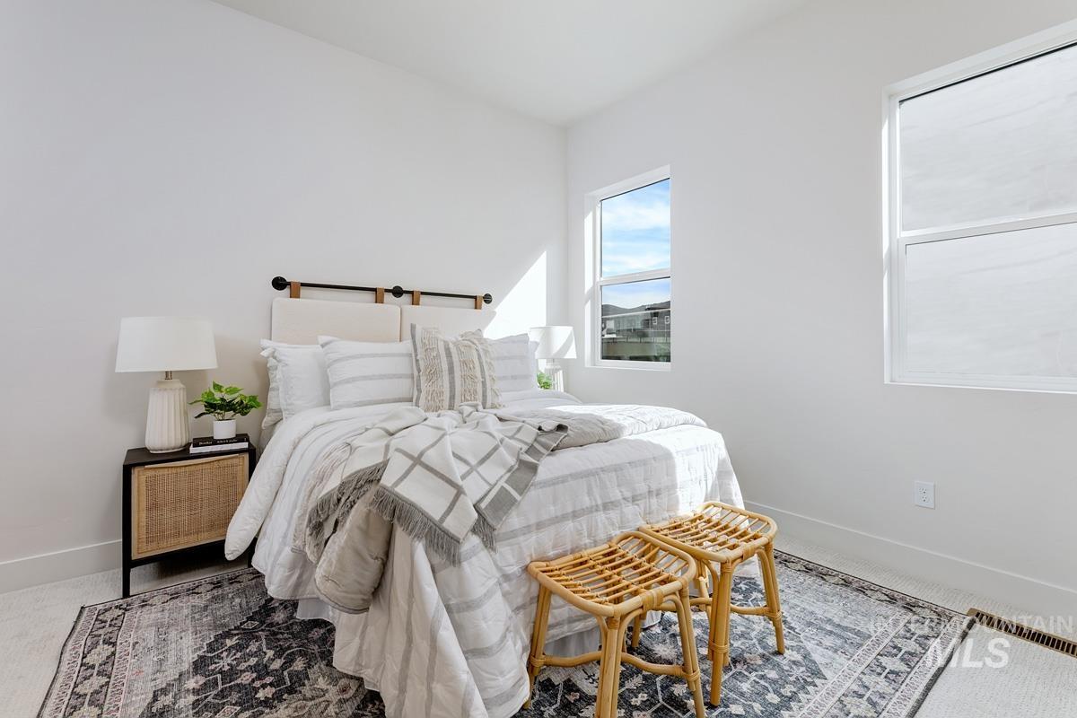 Bedroom with baseboards