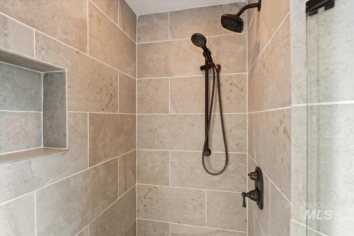 Bathroom view of a stall shower